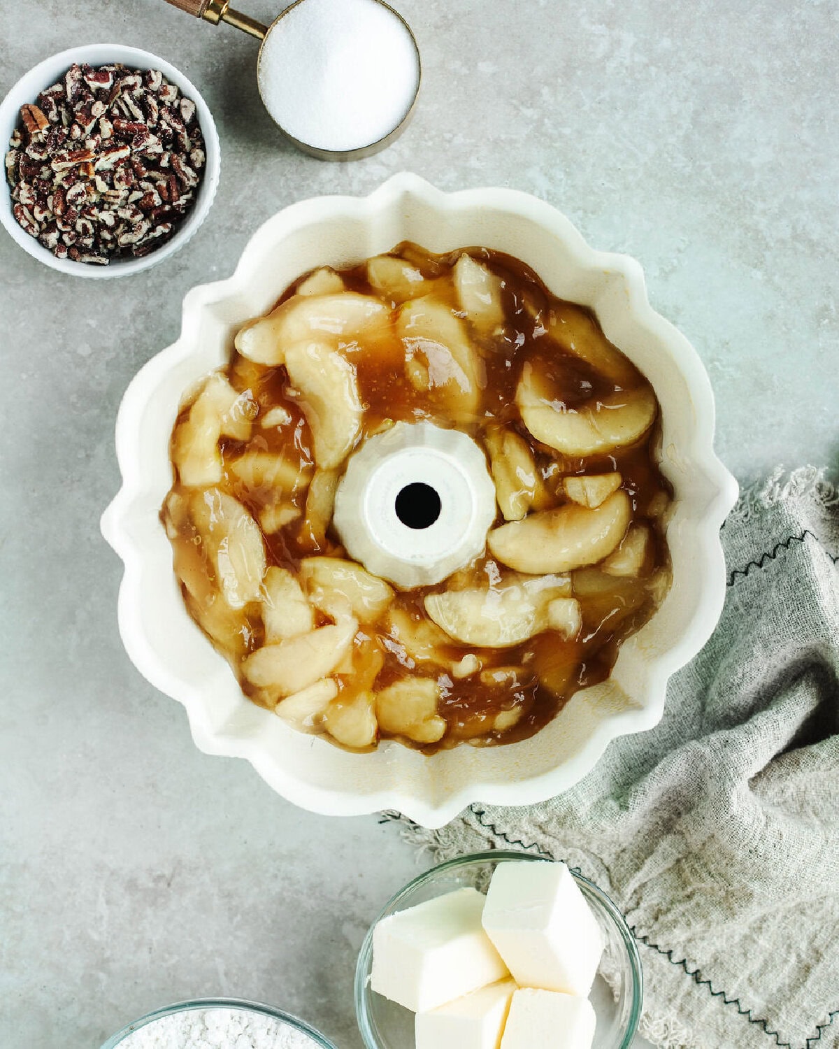 apple pie filling poured on the bottom of a greased bundt pan.