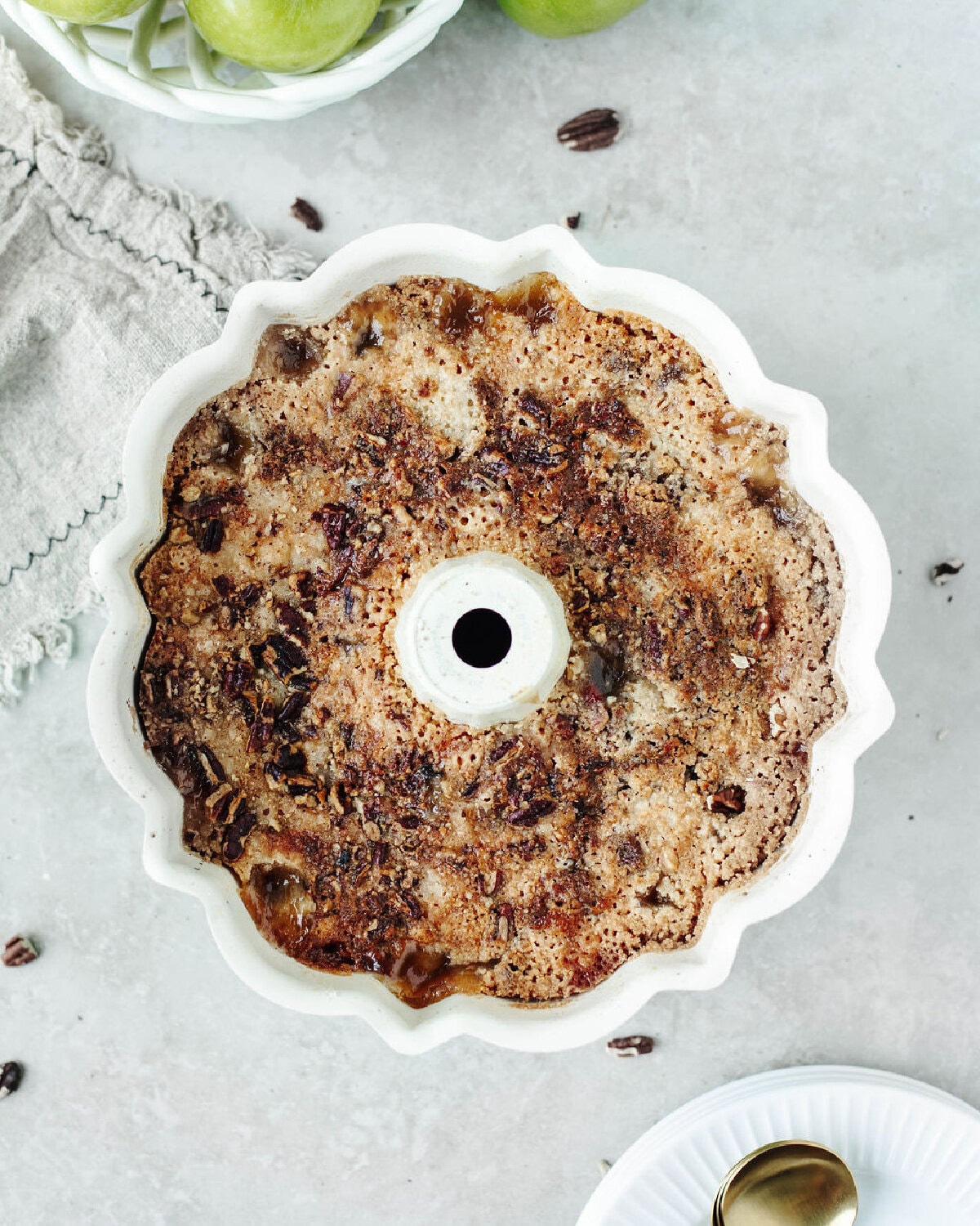 Warm Bisquick apple cobbler fresh from the oven with golden crust and spiced apple filling.
