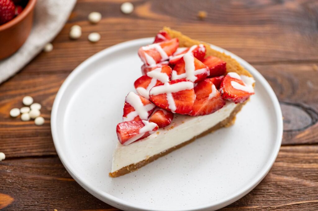 a slice of white chocolate strawberry pie