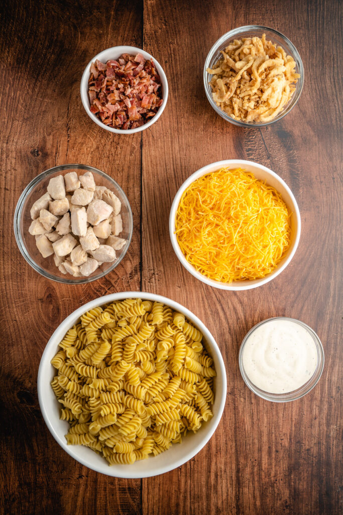 all the ingredients needed to make chicken bacon ranch pasta salad