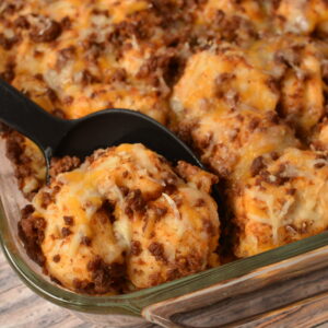 a scoop of sloppy joe biscuit casserole