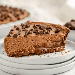 a serving of chocolate pie served with chocolate chips on top.