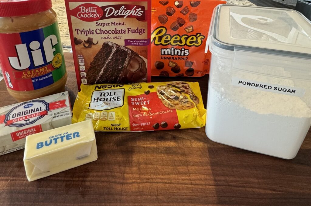 all the ingredients needed to make a chocolate peanut butter earthquake cake.