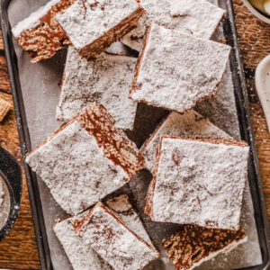 a crunchy cereal bar coated with chocolate, peanut butter, and powdered sugar.