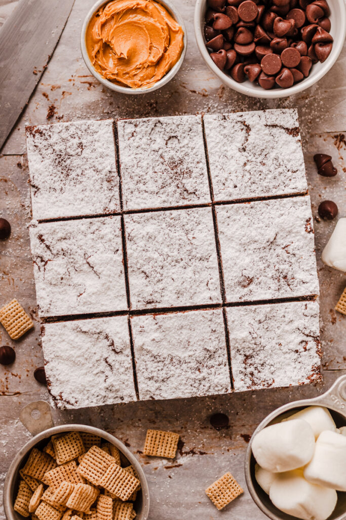 sliced cereal bars on a piece of parchment paper.