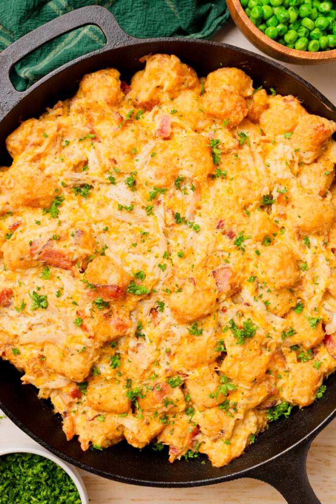 a cheesy bake made with simple ingredients in a cast iron skillet.