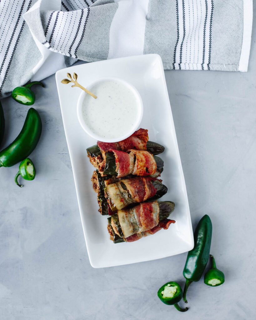 a serving platter with a spicy game day appetizer.