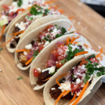 fish tacos served with a fresh slaw