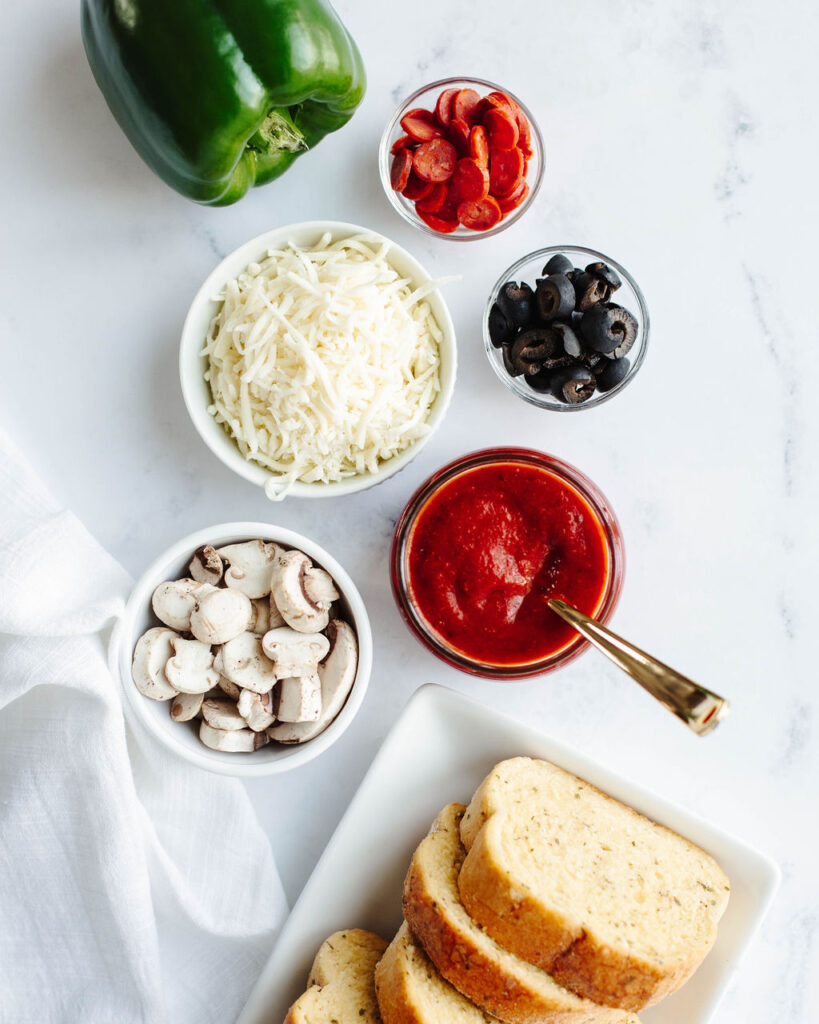 all the ingredients needed to make Garlic Bread Pizza