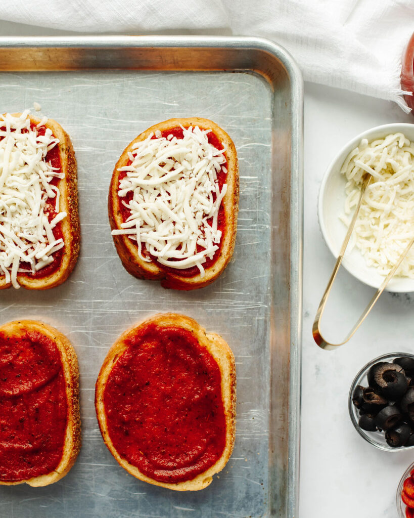 sauce and cheese on top of frozen Texas toast.
