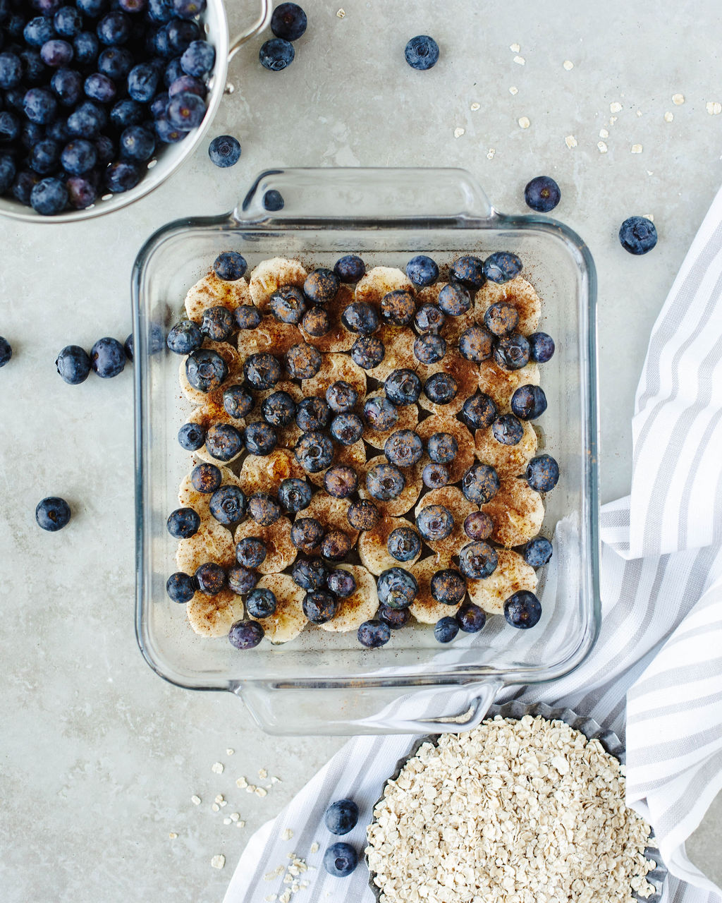 cinnamon covered blueberries in a baking dish.