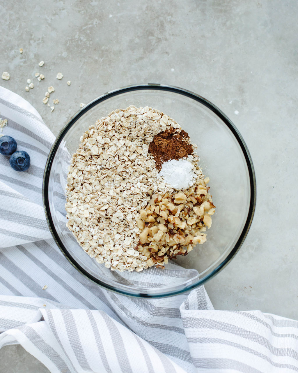 dry ingredients for baked oatmeal combined in a mixing bowl.