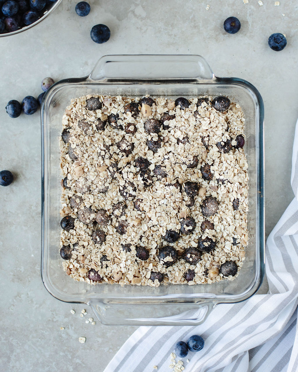 a homemade oat mixture in a glass baking dish.