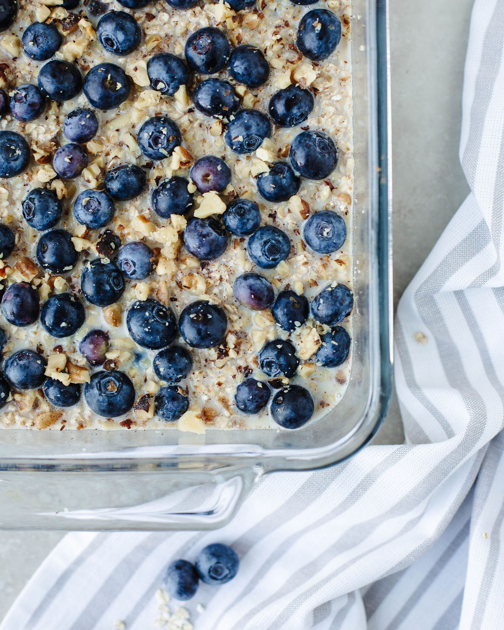 fresh blueberries over an oat mixture.
