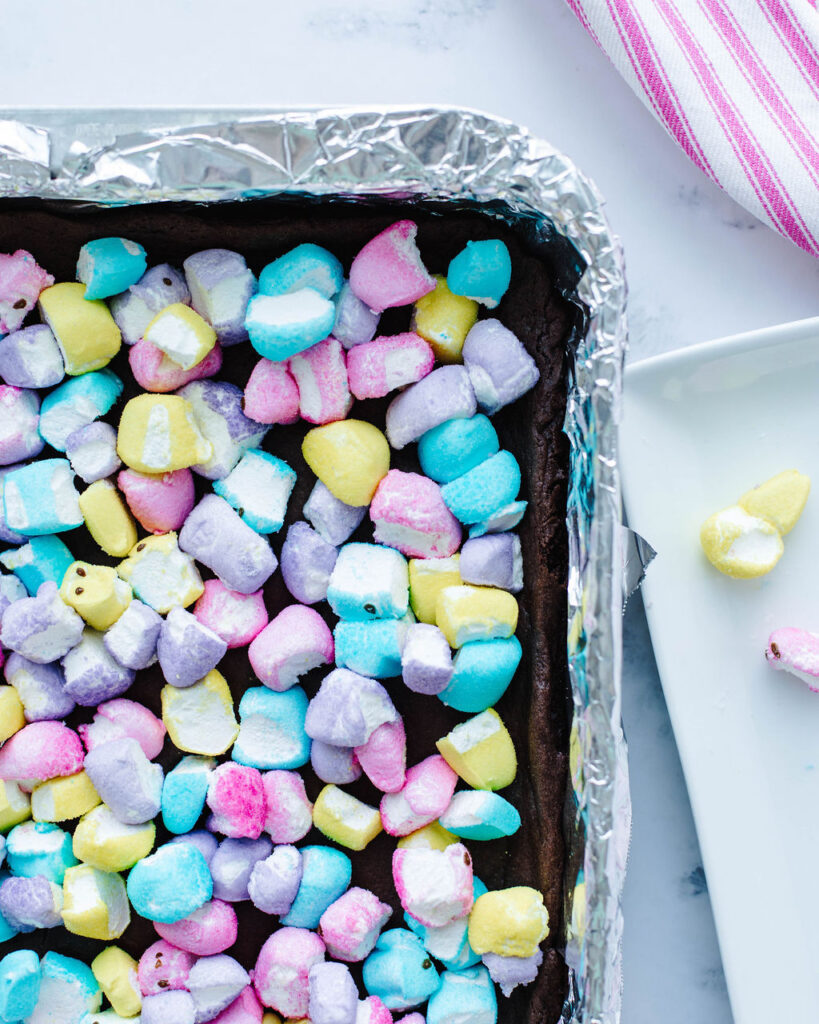chopped marshmallow pieces on top of cake batter.