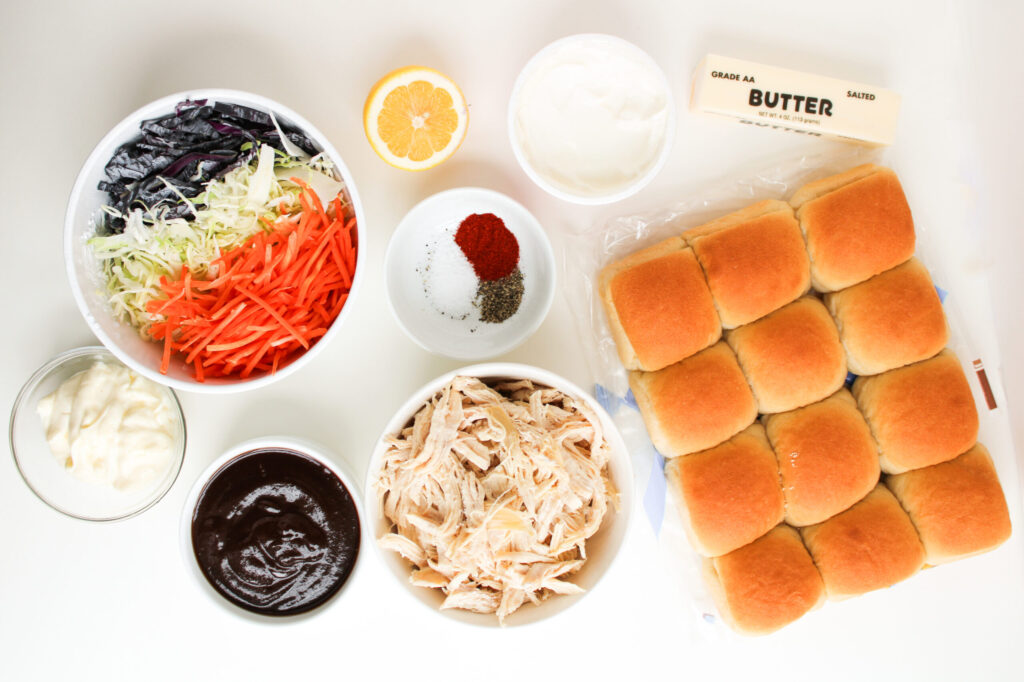 all the ingredients needed to make BBQ chicken sliders in the slow cooker.