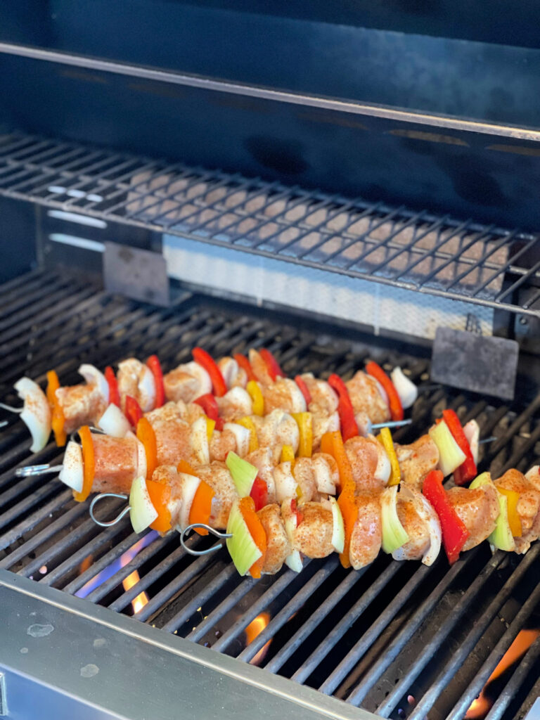 bell peppers, onions, and chicken grilled on skewers