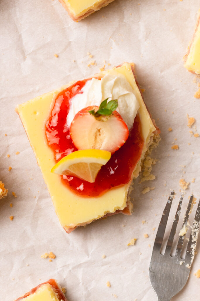 a refreshing light sweet treat with preserves and whipped cream on top.
