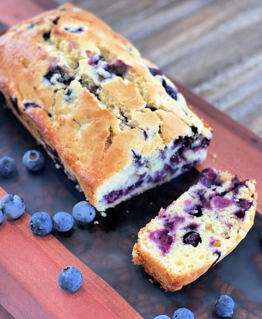 a loaf of fresh blueberry cream cheese bread