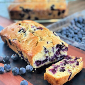 juicy blueberries throughout a quick bread recipe