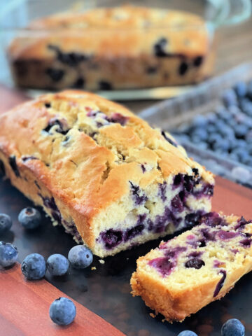 juicy blueberries throughout a quick bread recipe