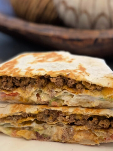 crunchwrap supreme stacked on a plate