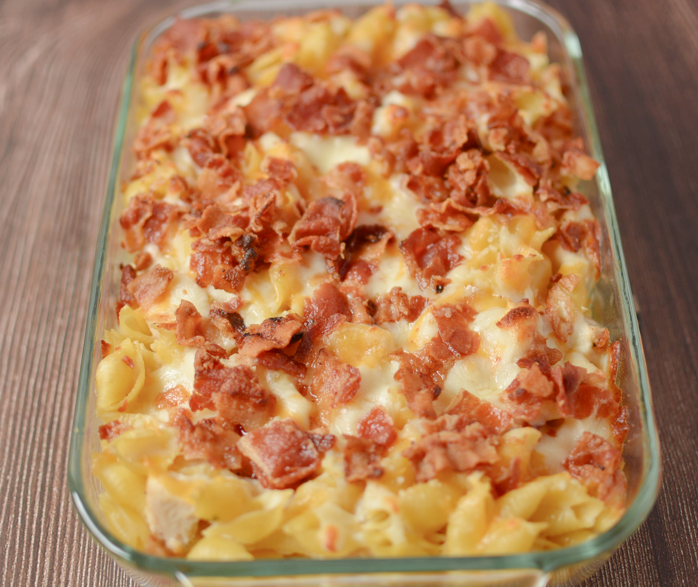 a chicken casserole with pasta, bacon, cheese, and more.