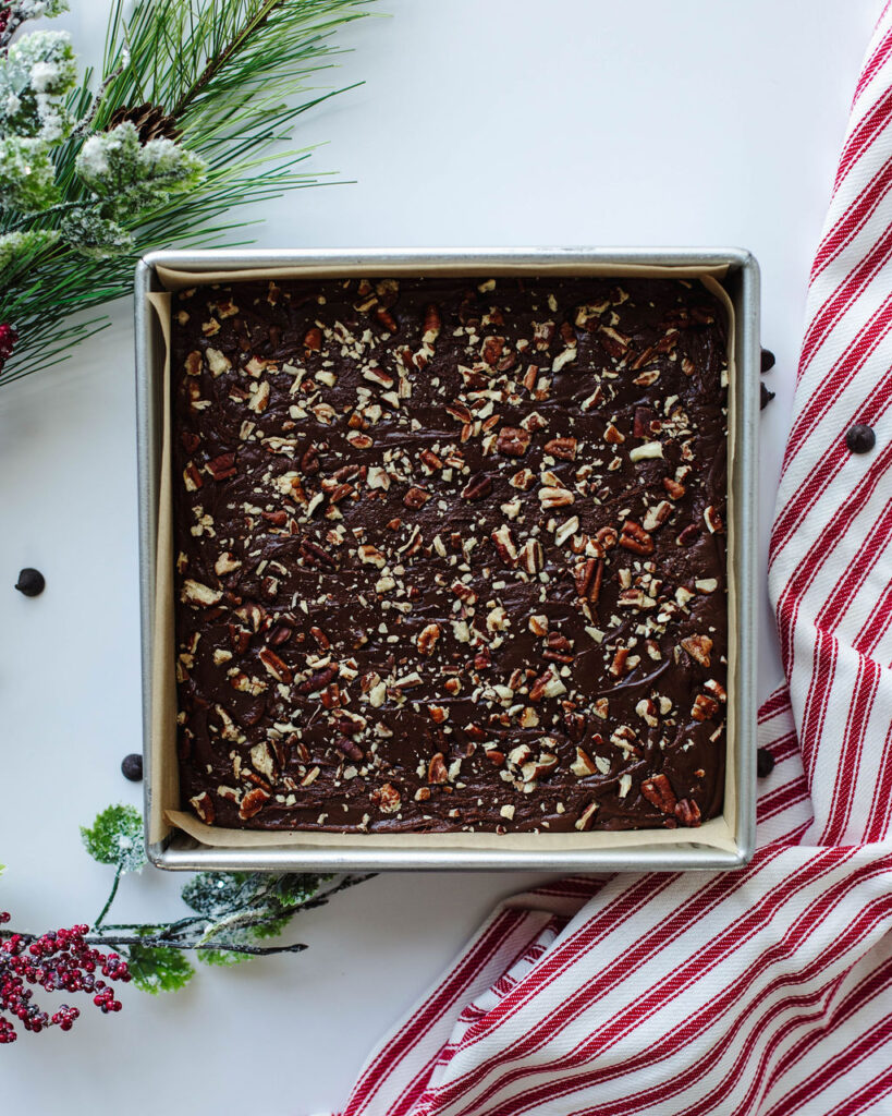 an 8x8 baking pan of creamy chocolate dessert.