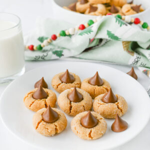peanut butter blossoms on a white plate.