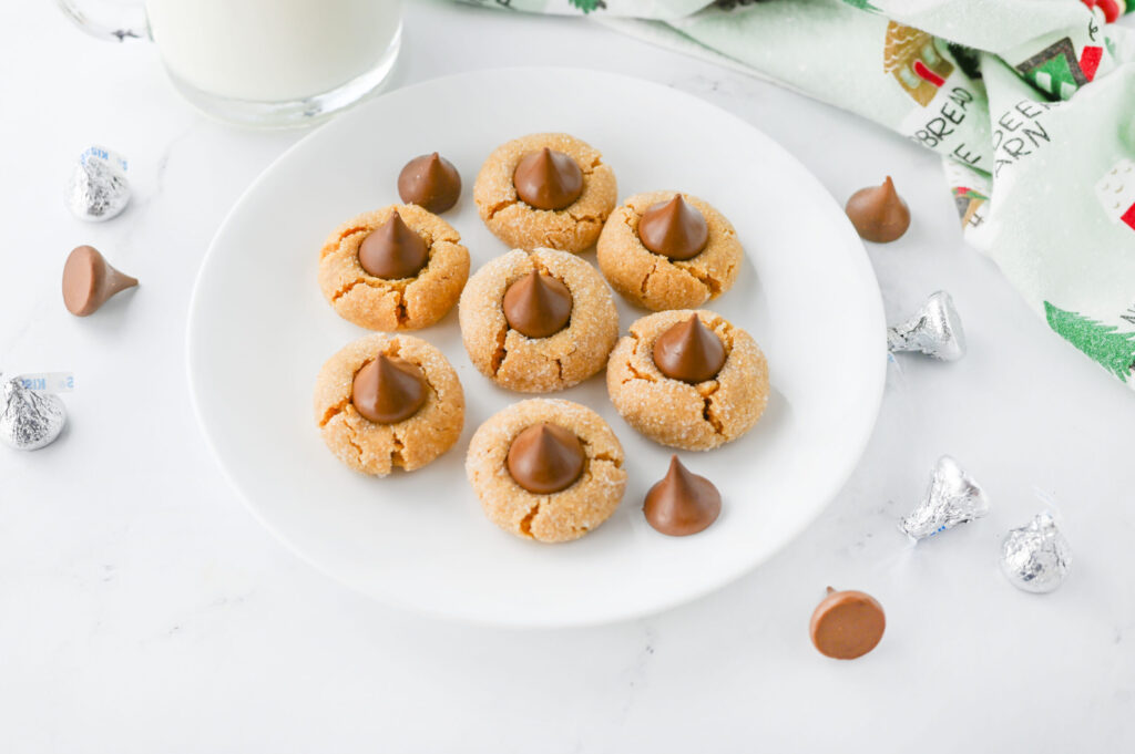 a soft and chewy peanut butter cookie with a Hershey kiss in the center.