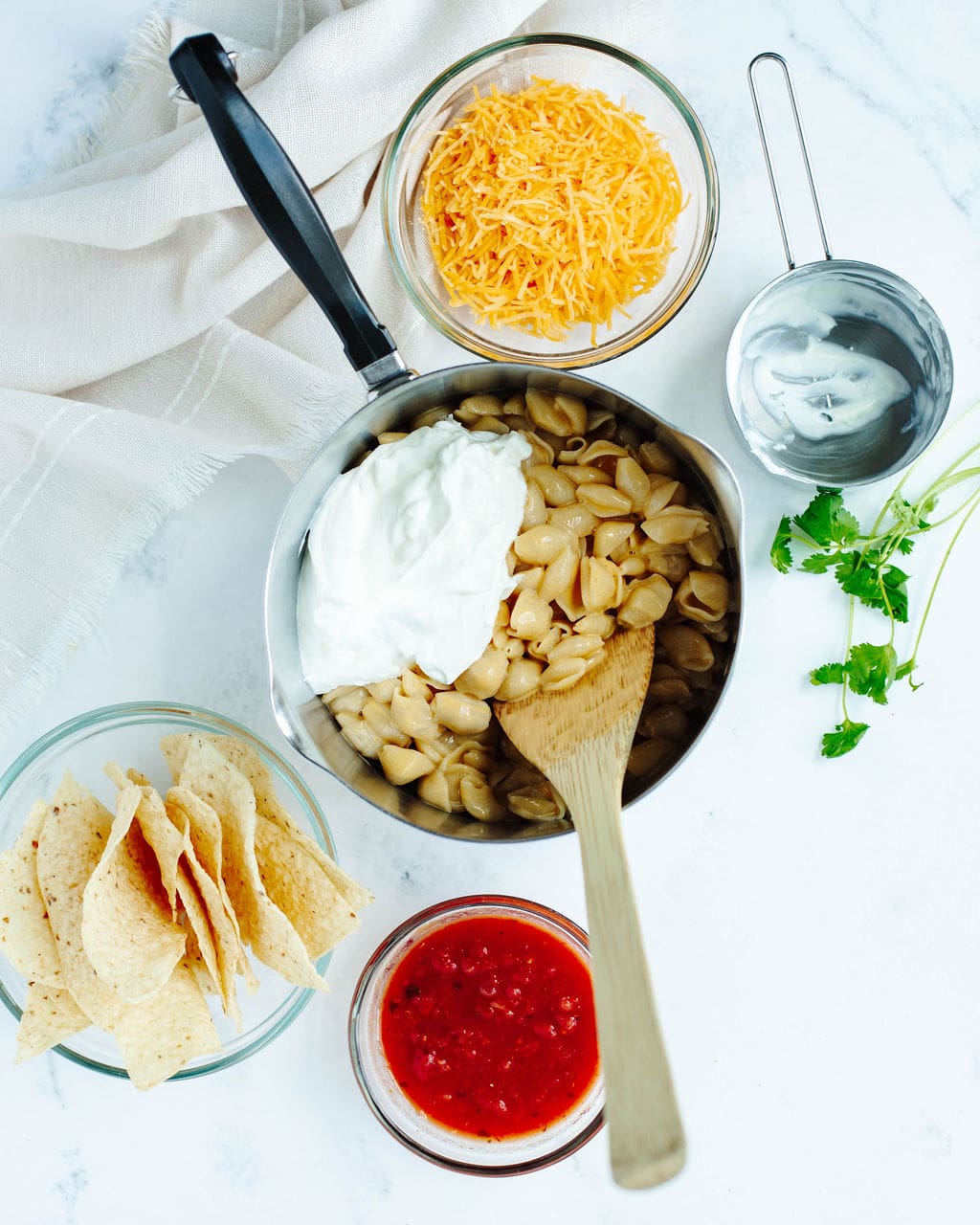 sour cream stirred into cooked macaroni pasta.