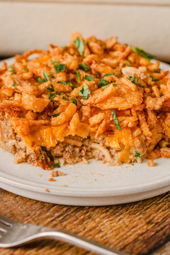 an up close look at beef and rice casserole on a plate.