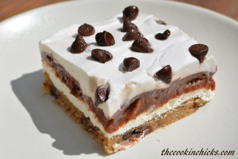 a slice of chocolate chip pudding cake on a plate.