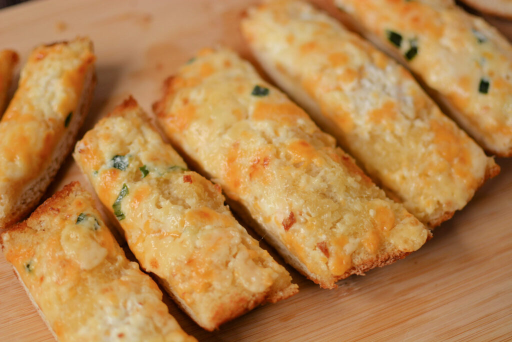baked french bread with cheese and garlic on top