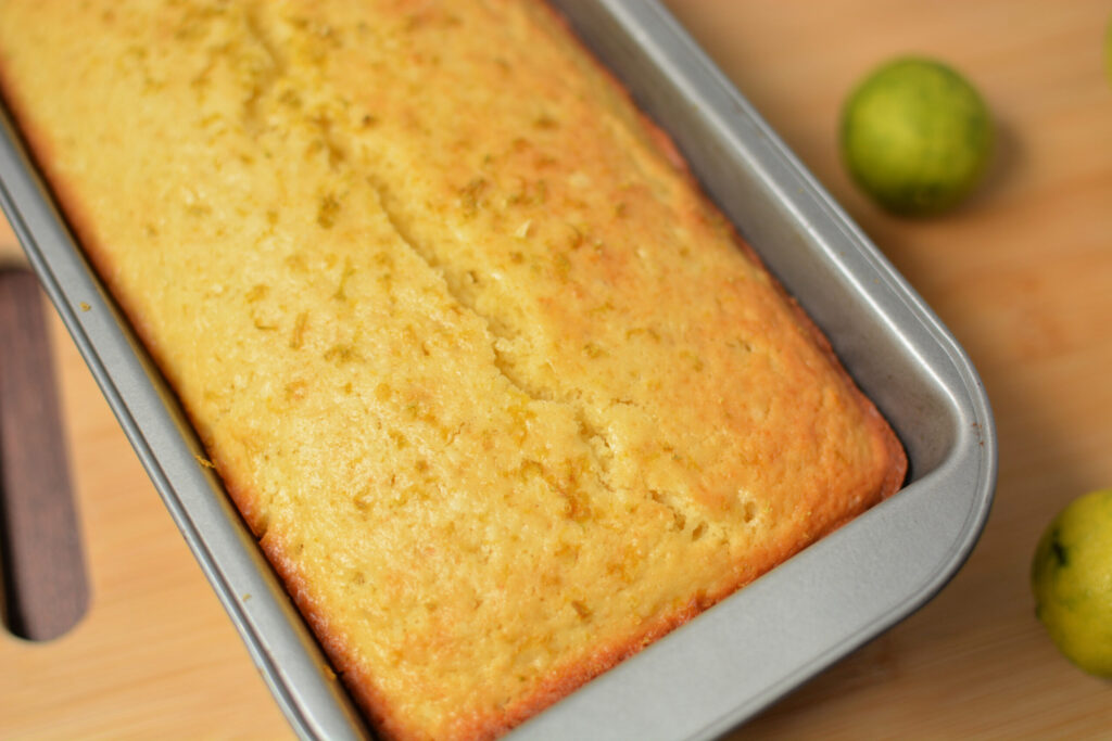 zesty key lime bread baked in a loaf pan
