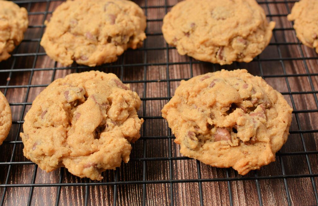 cookies lined up on a cooling rack