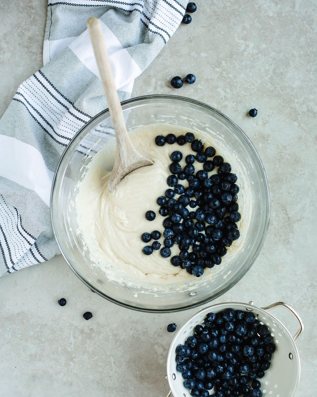 blueberries folded into cake batter.
