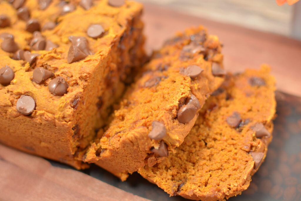 baked and sliced loaf of 3 ingredient pumpkin chocolate chip bread