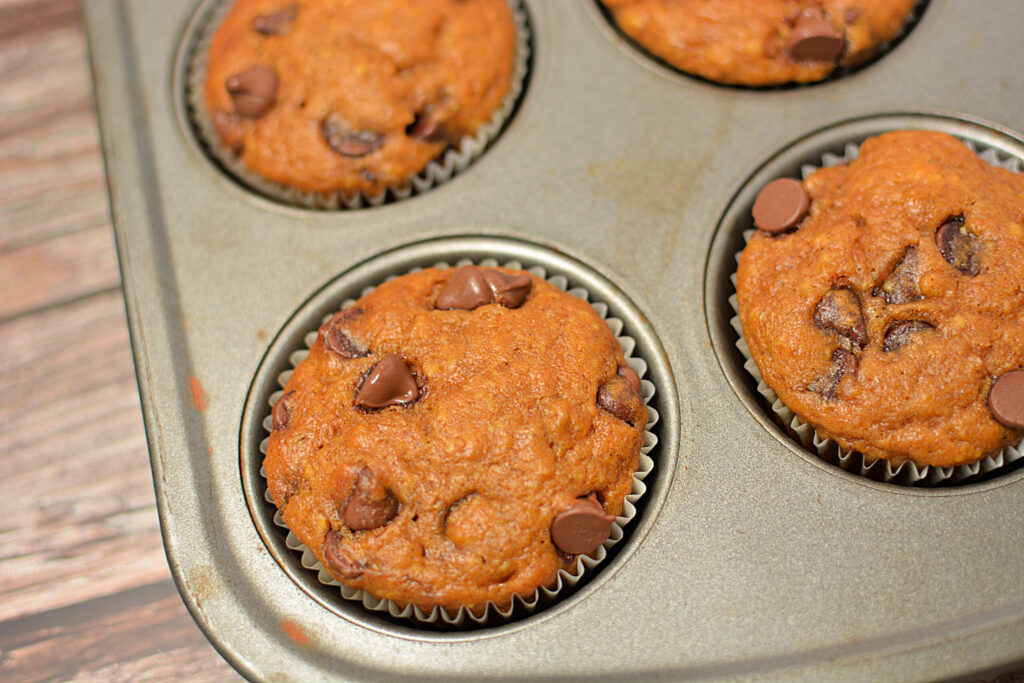 an up close look at a pumpkin chocolate chip banana muffin