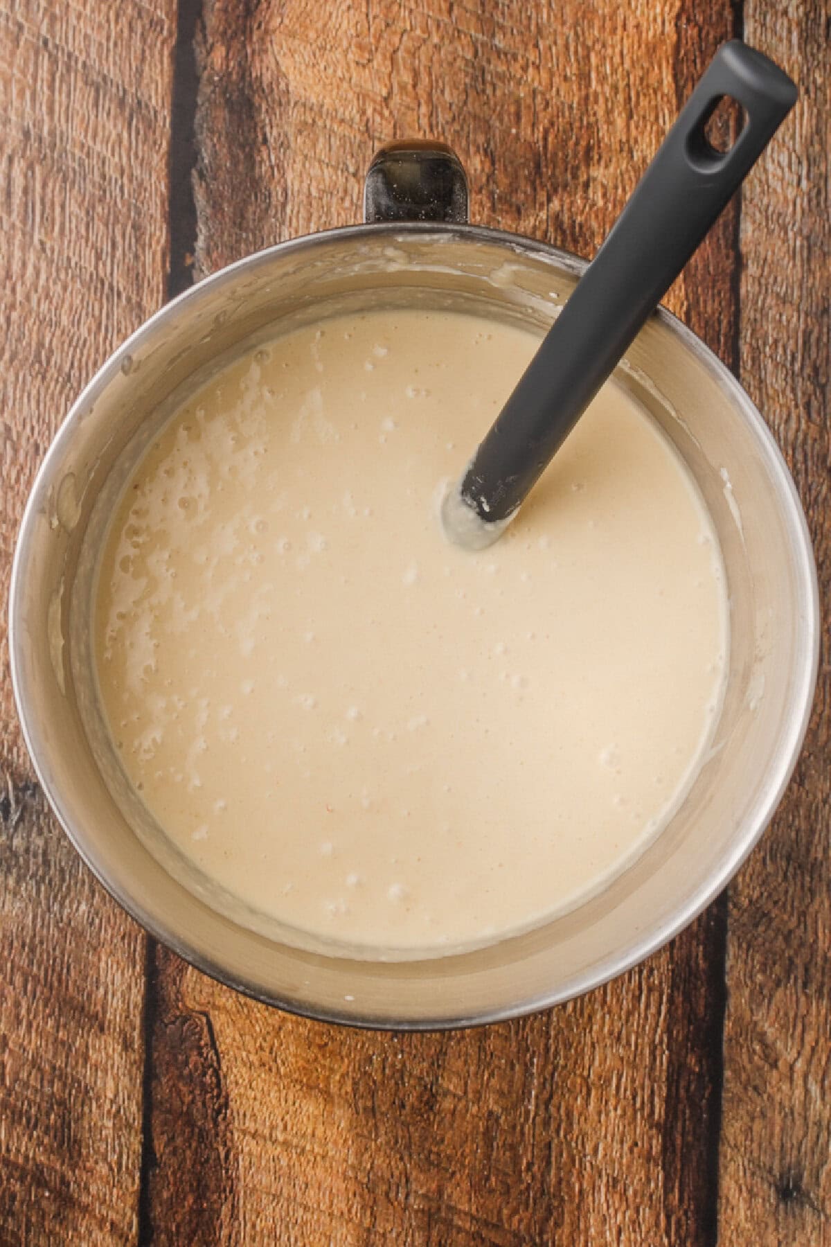 cake batter combined in a mixing bowl.