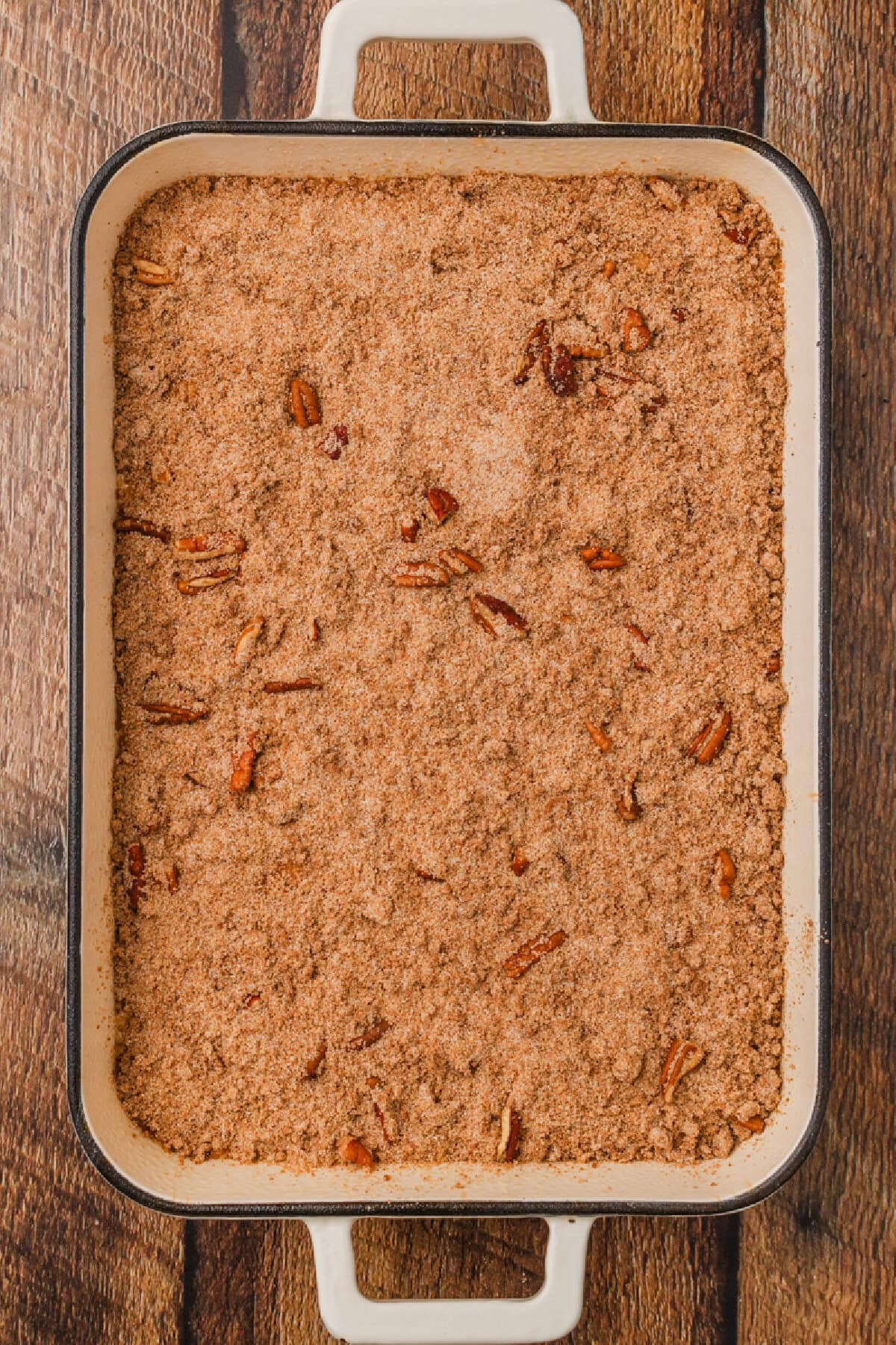 the remaining cinnamon streusel sprinkled on top of cake batter.