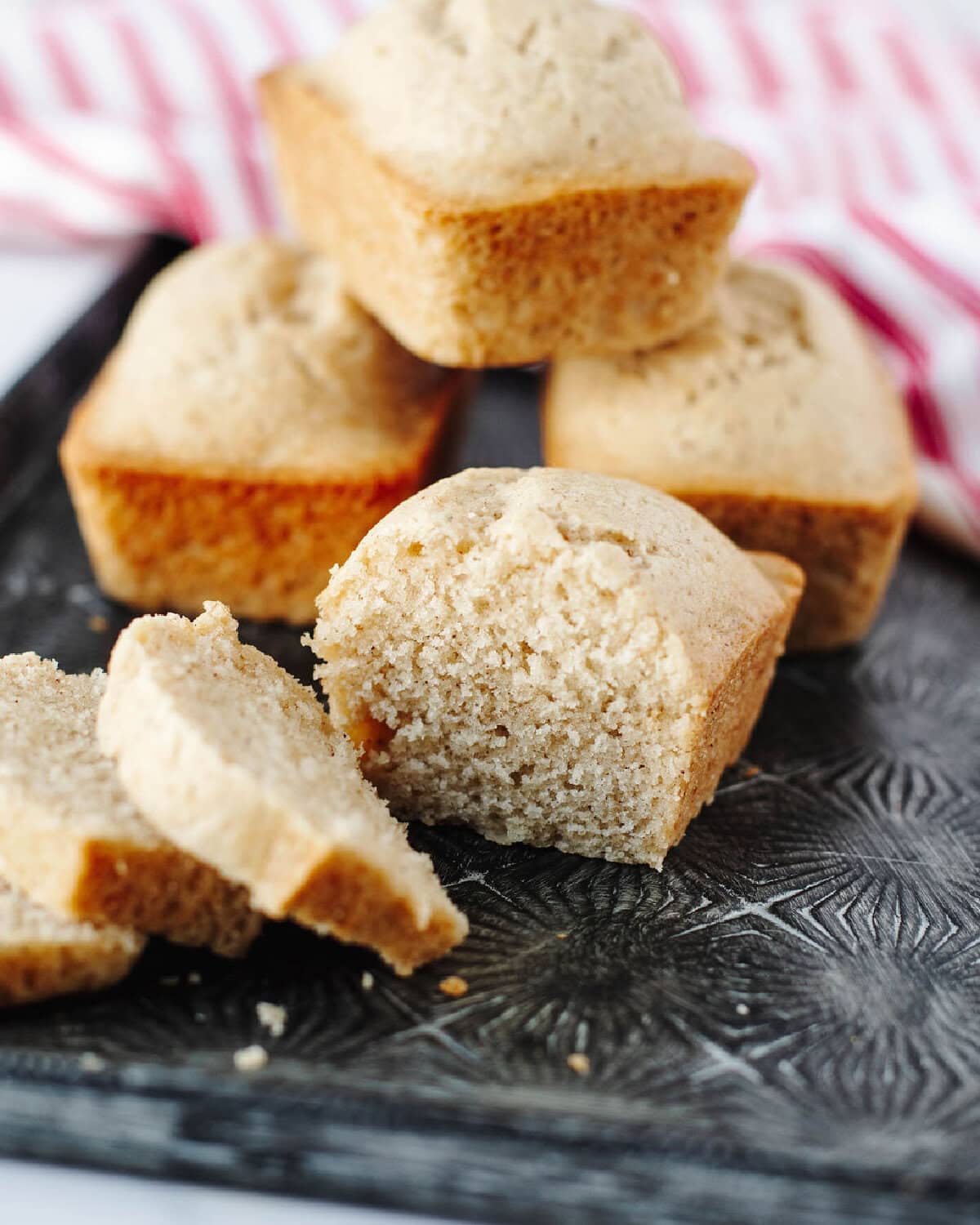 Sliced Eggnog Mini Loaf showing moist, spiced interior with hints of cinnamon and nutmeg.