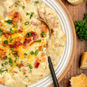 tender chicken, vegetables, and potatoes combined into a soup.