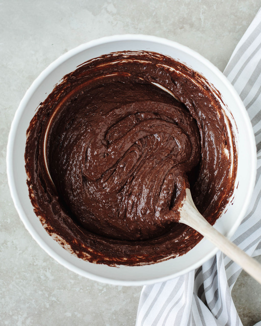 chocolate dump cake mix in a white bowl.