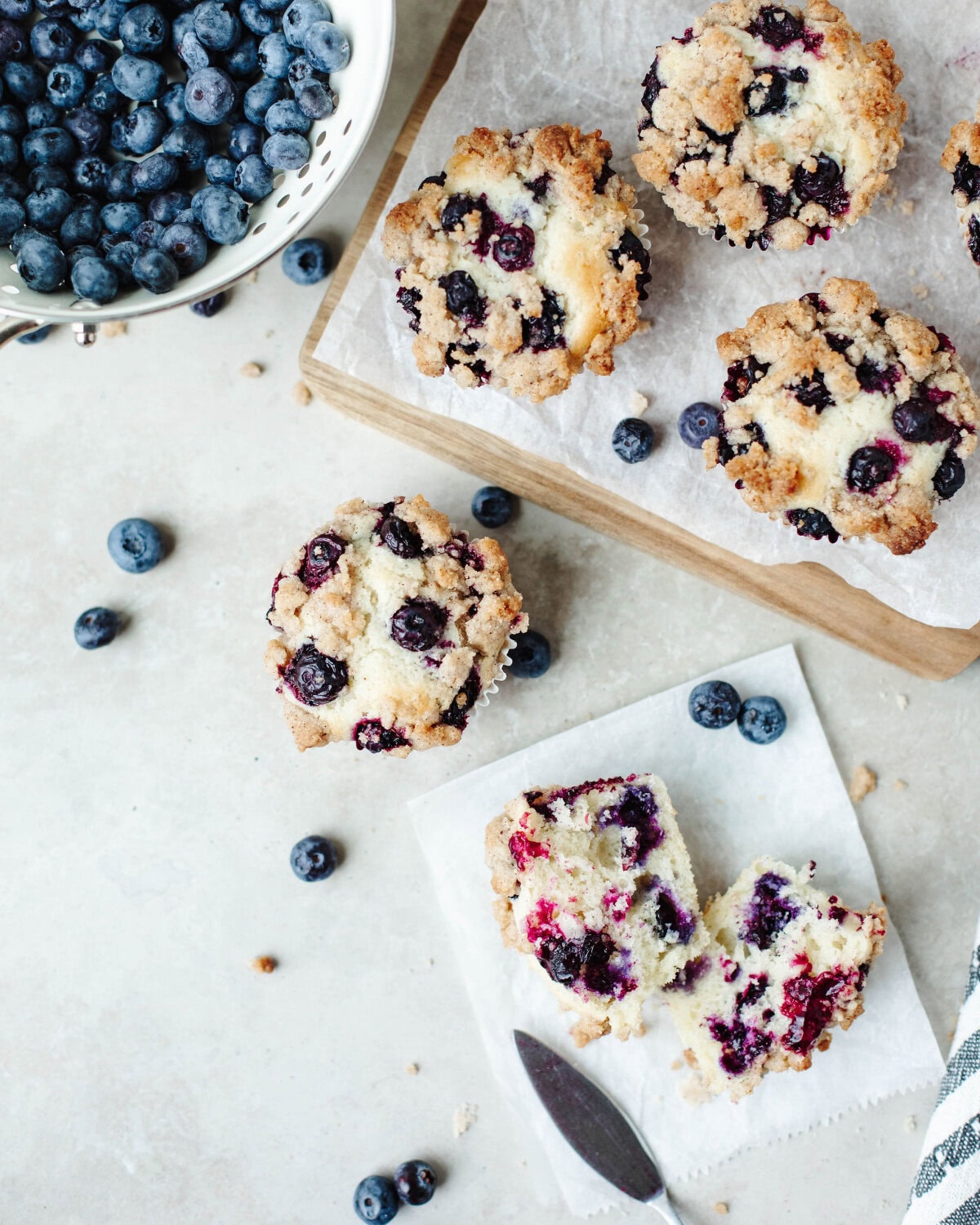 Bakery-style blueberry streusel muffins with golden crumb topping.