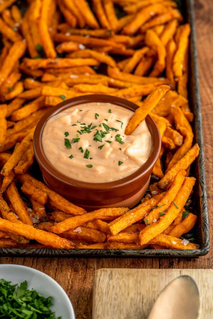 a creamy sweet and spicy mayonnaise based boom boom sauce in a bowl.