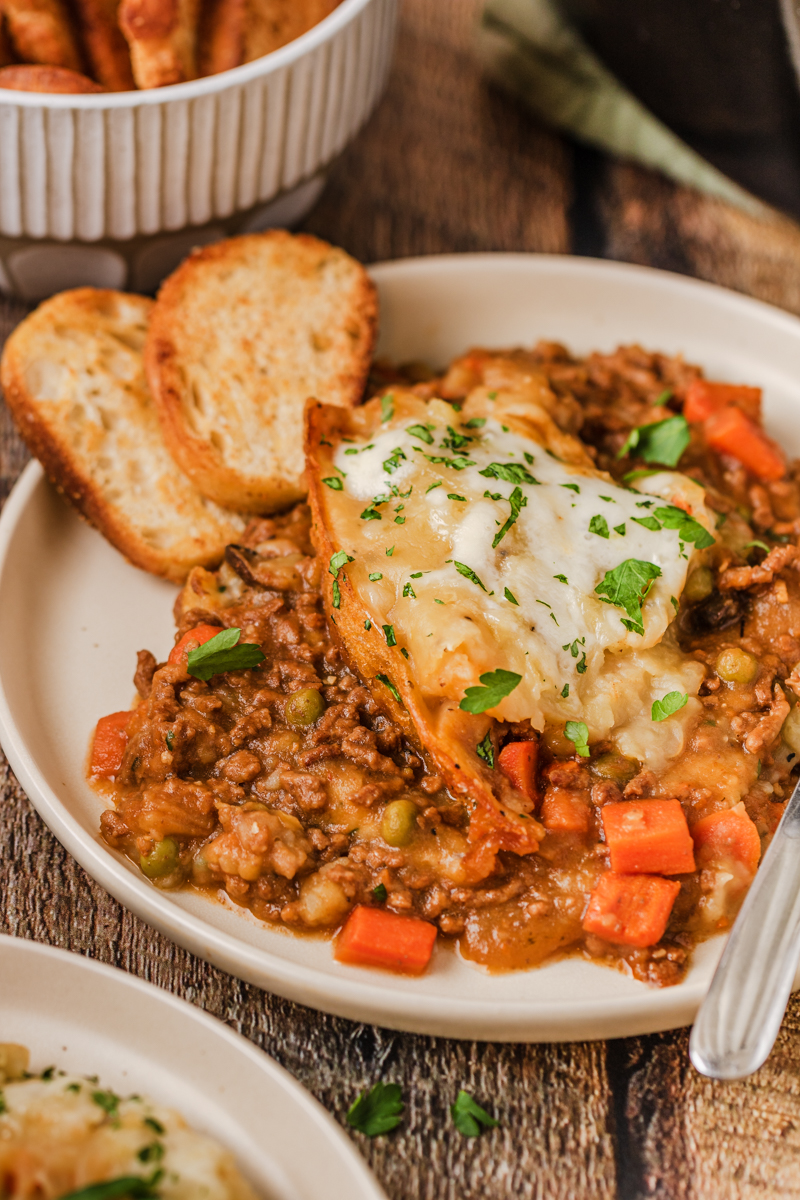 slow cooker cottage pie served on a plate.