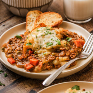 tender ground beef, vegetables, mashed potatoes in a slow cooked gravy.