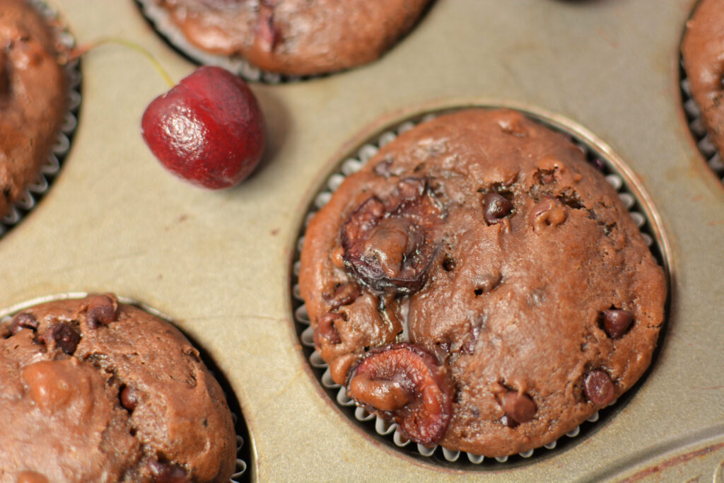 an up close look at chocolate cherry muffins.