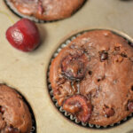 an up close look at chocolate cherry muffins.